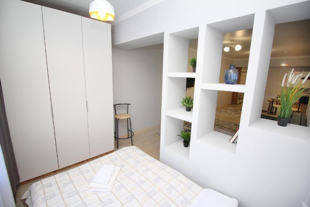 Алматы: New and cozy studio in the best area! 4