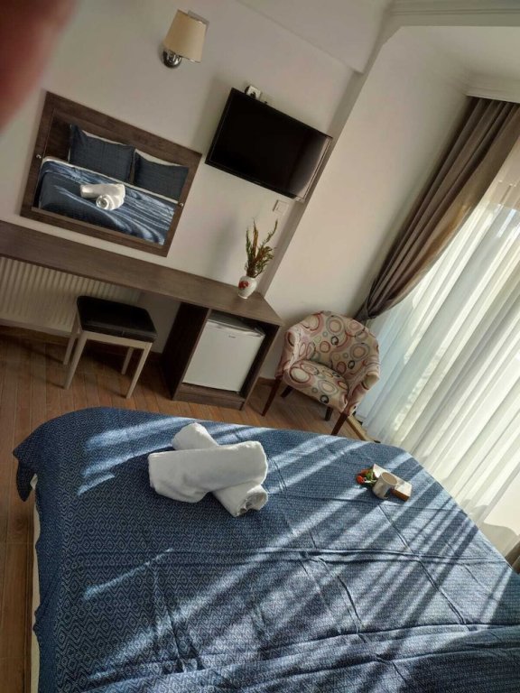 Гузеляли: Adaya Karşı Otel