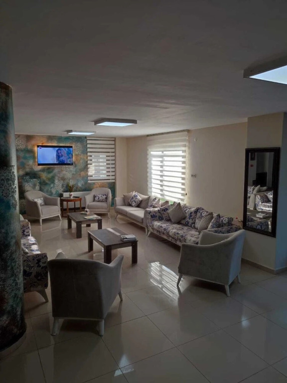 Гузеляли: Adaya Karşı Otel