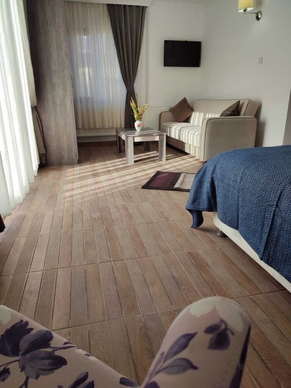 Гузеляли: Adaya Karşı Otel