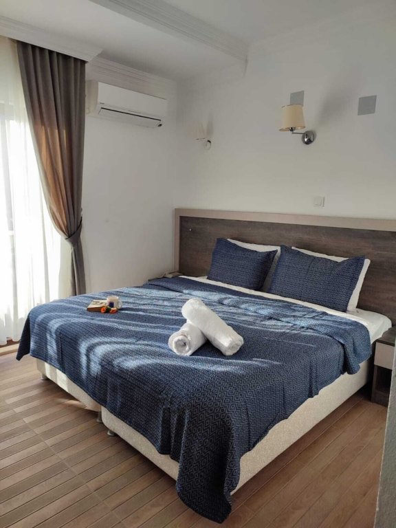 Гузеляли: Adaya Karşı Otel