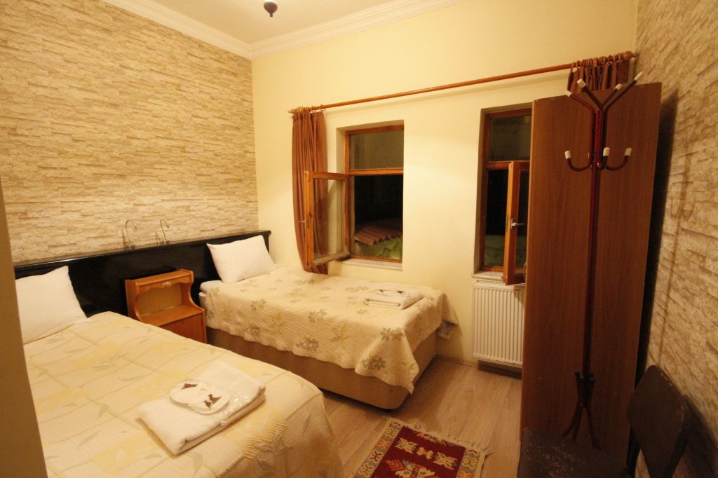 Айвали: In Stone House