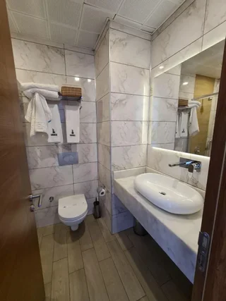 Бурхание: Karakas Hotel