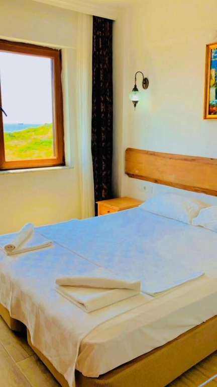 Бозджаада: Sukha Inn Hotel & Beach
