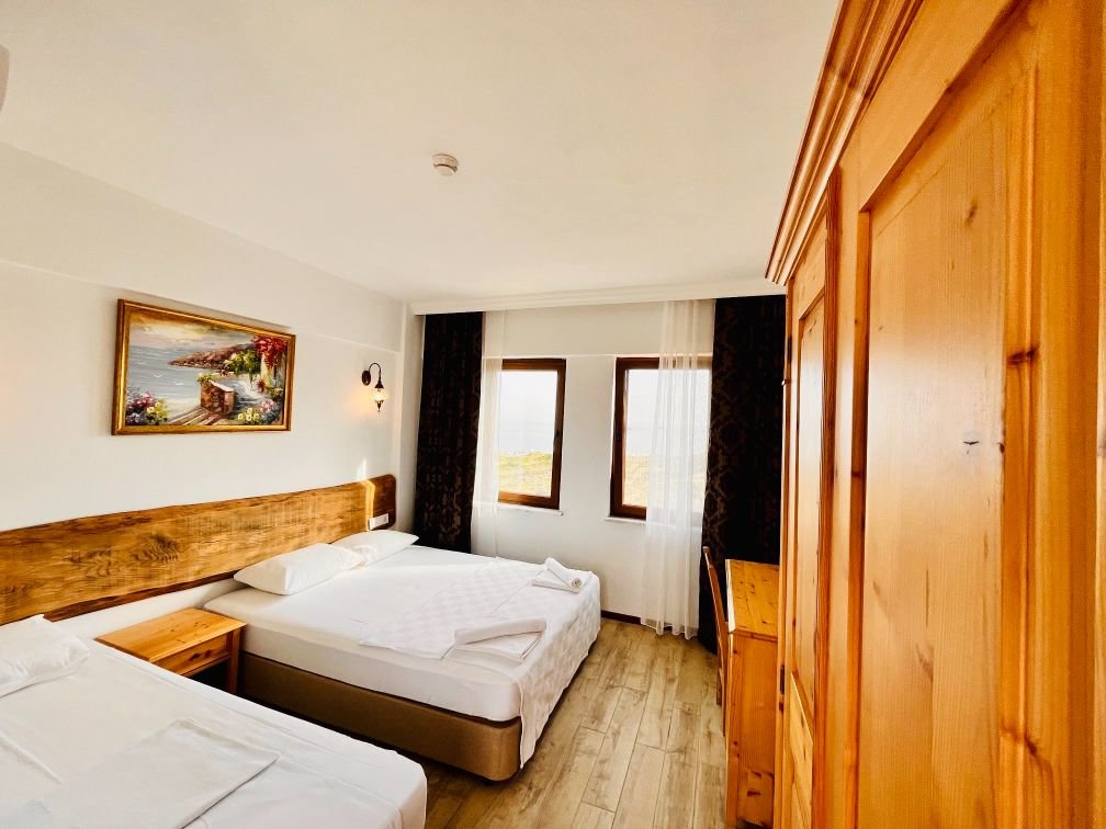 Бозджаада: Sukha Inn Hotel & Beach