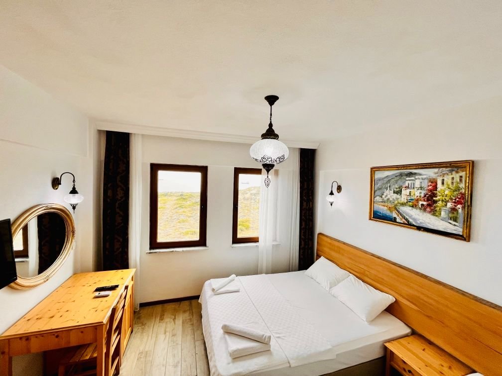 Бозджаада: Sukha Inn Hotel & Beach