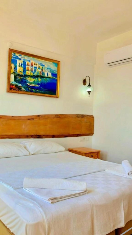 Бозджаада: Sukha Inn Hotel & Beach