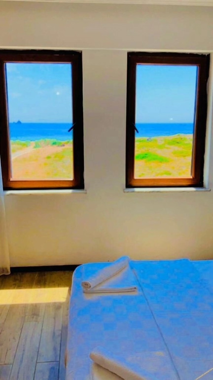 Бозджаада: Sukha Inn Hotel & Beach