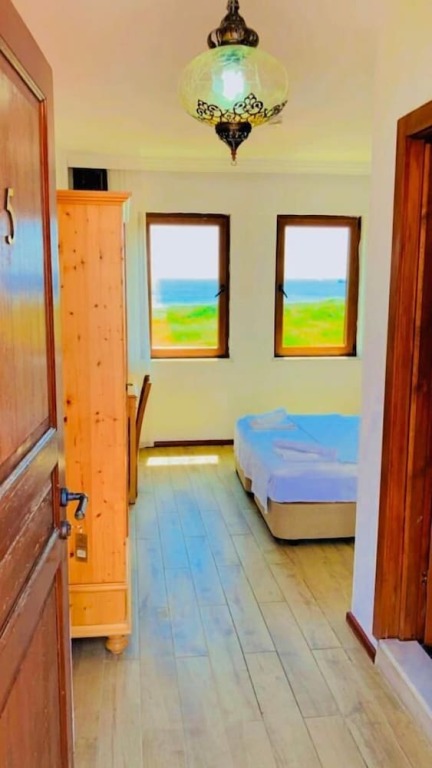 Бозджаада: Sukha Inn Hotel & Beach