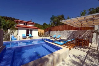 Исламлар: Villa Tuzer