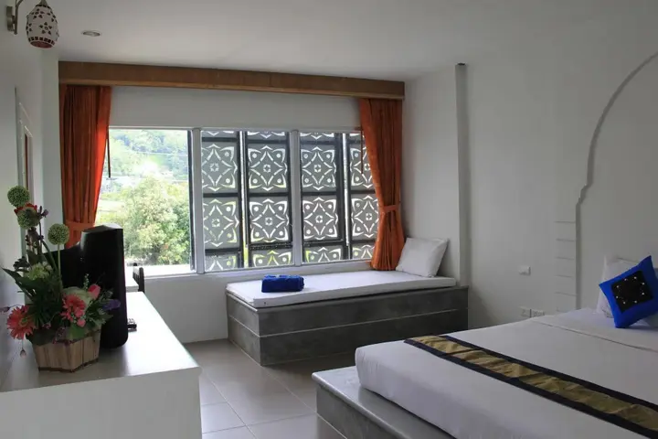 Тхаланг: Dinar Lodge