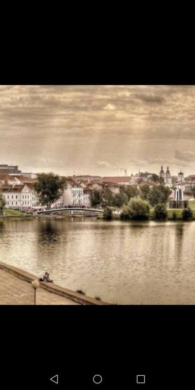 Минск: Апартаменты Квартира с видом на набережную реки.