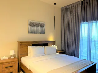 Дубай: Stunning Stay Park View JVC -1bed With Balcony