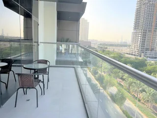 Дубай: Stunning Stay Park View JVC -1bed With Balcony
