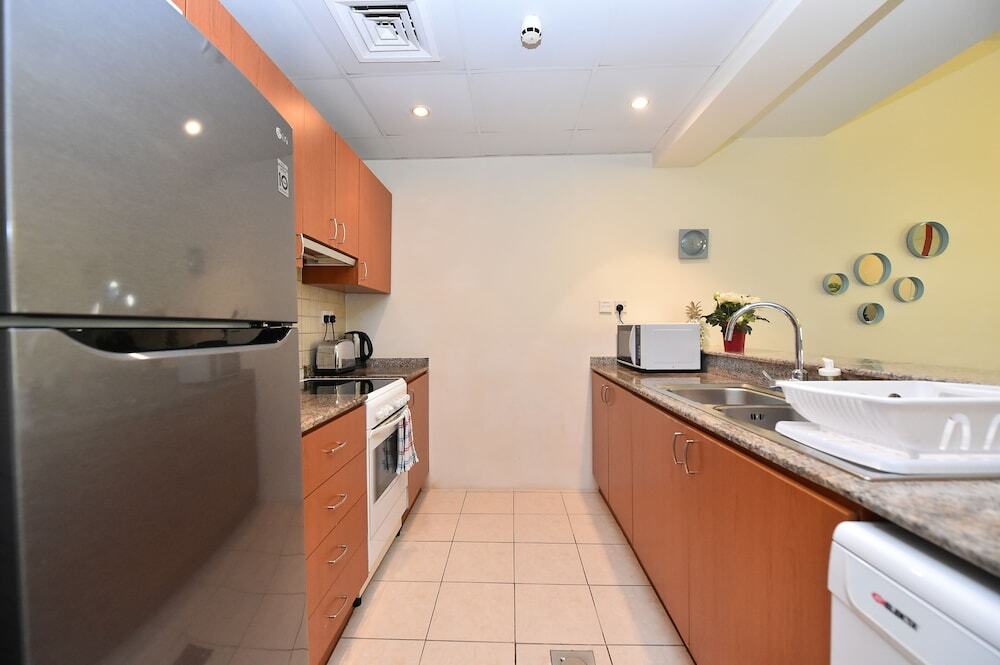 Дубай: ADN - 1 Bedroom Apartment in The Greens