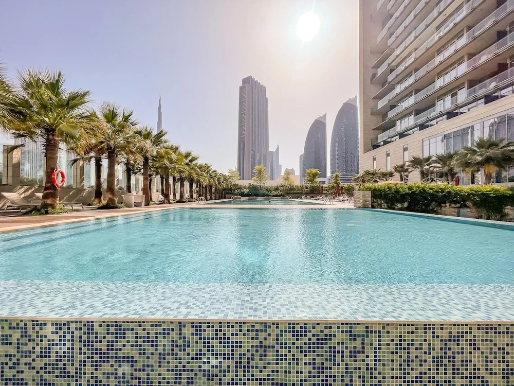 Дубай: Duplex 2BR Burj Daman - DIFC