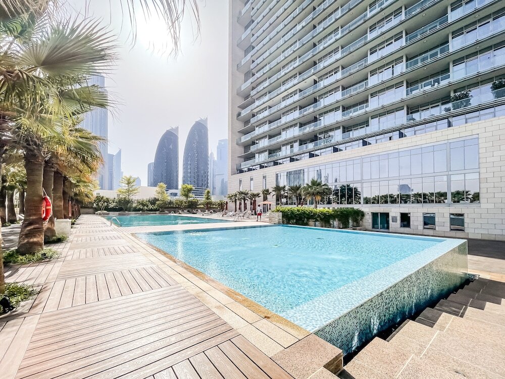 Дубай: Duplex 2BR Burj Daman - DIFC