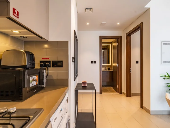 Дубай: Apartments Cozy 1 BR Burj Khalifa Glimpse Sobha Hartland