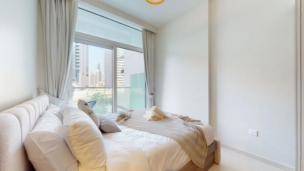 Дубай: WelHome - Cozy 1BR With Private Balcony Steps From the Canal