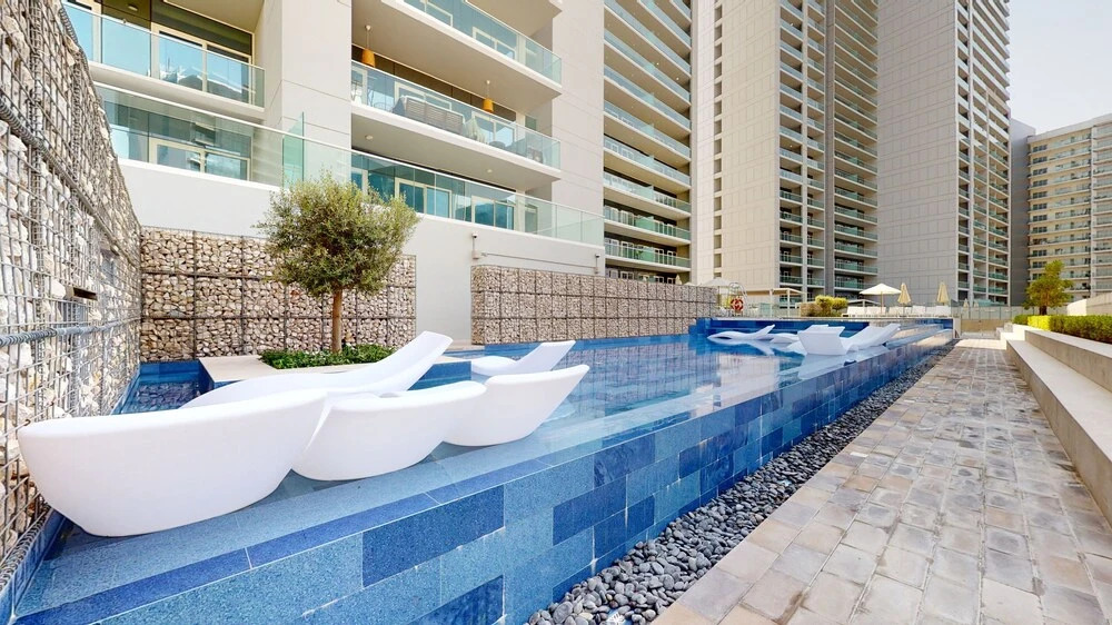 Дубай: WelHome - Cozy 1BR With Private Balcony Steps From the Canal