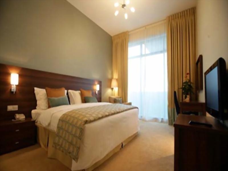 Дубай: Nojoum Hotel Apartments