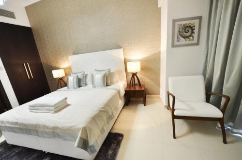 Дубай: Key One Homes - Cayan Tower