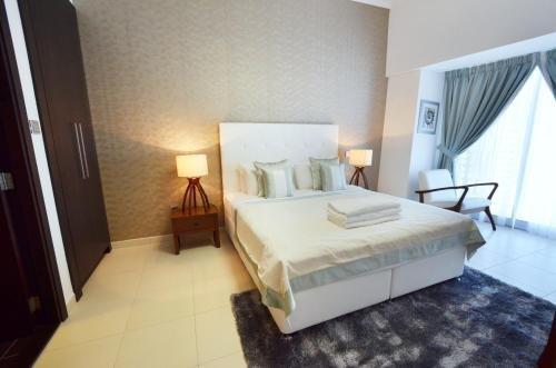 Дубай: Key One Homes - Cayan Tower