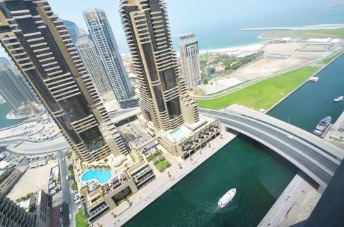 Дубай: Key One Homes - Cayan Tower