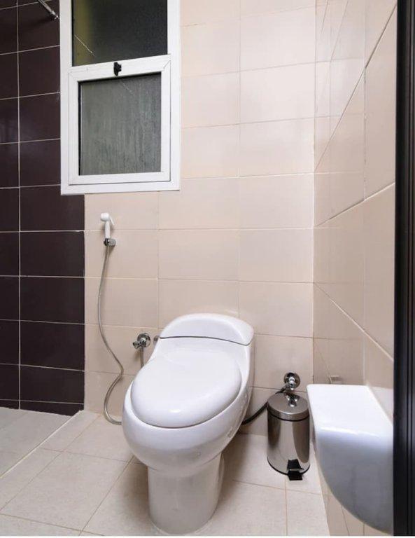 Дубай: OYO 144 Home Sheikh Zayed view Apartment