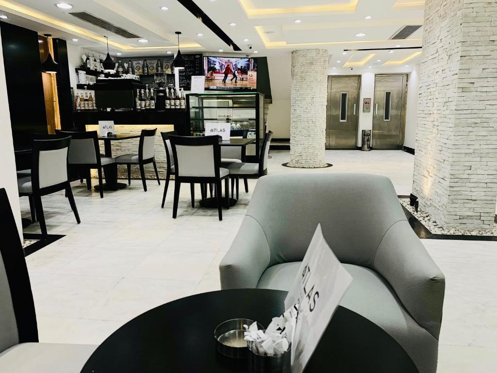 Отель Atlas International Hotels — фото 6