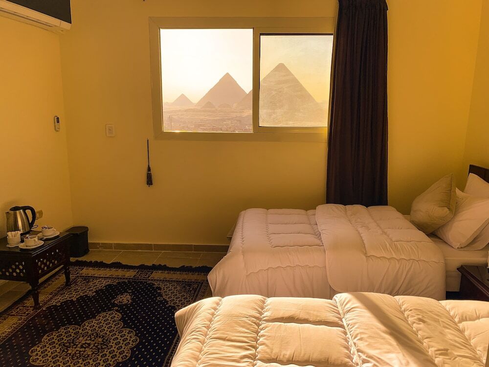Гиза: 9 Pyramids Inn