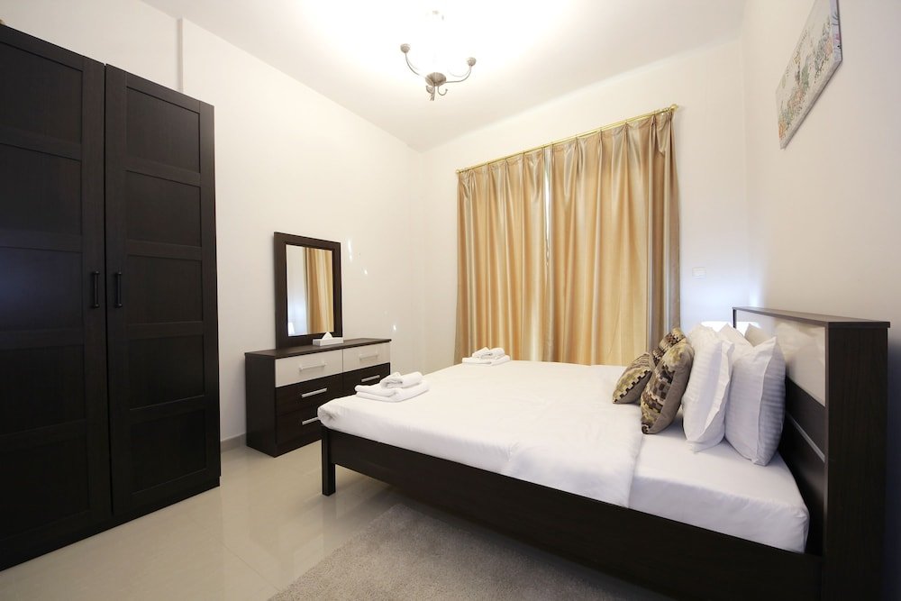 Дубай: Signature Holiday Home-Elite Residence 1