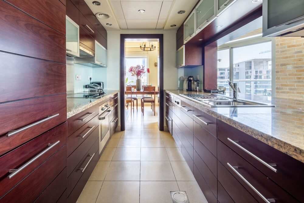 Дубай: Luxury Redefined 1BR in the Heart of Downtown Dubai!