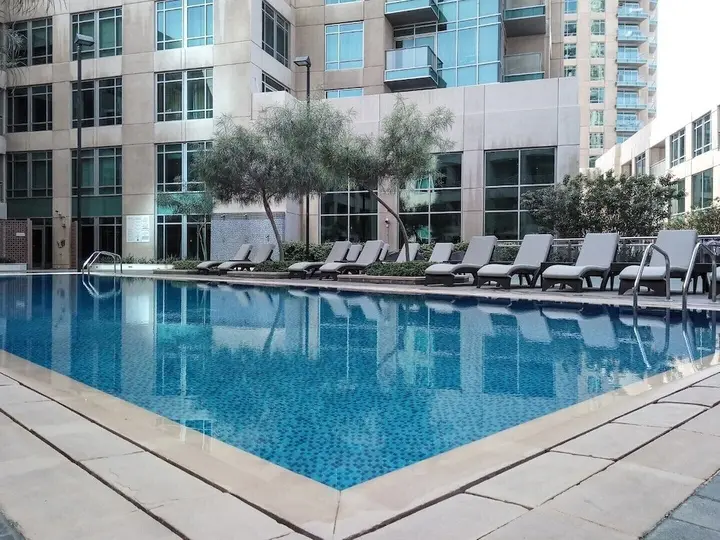 Дубай: Luxury Redefined 1BR in the Heart of Downtown Dubai!