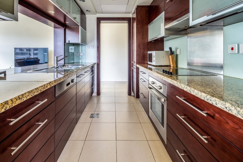 Дубай: Luxury Redefined 1BR in the Heart of Downtown Dubai!