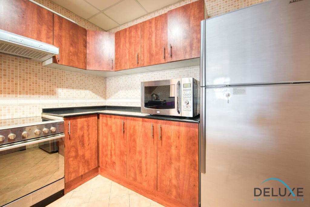 Дубай: Lovely 1BR in Sports City With Golf Course Views!