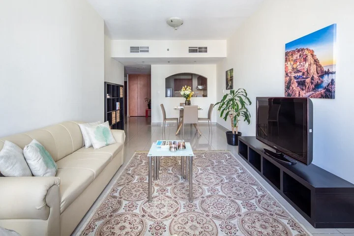 Дубай: Remarkable & Upscale Living in This 1BR Apartment at JLT