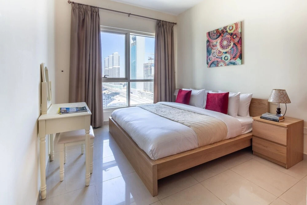 Дубай: Remarkable & Upscale Living in This 1BR Apartment at JLT