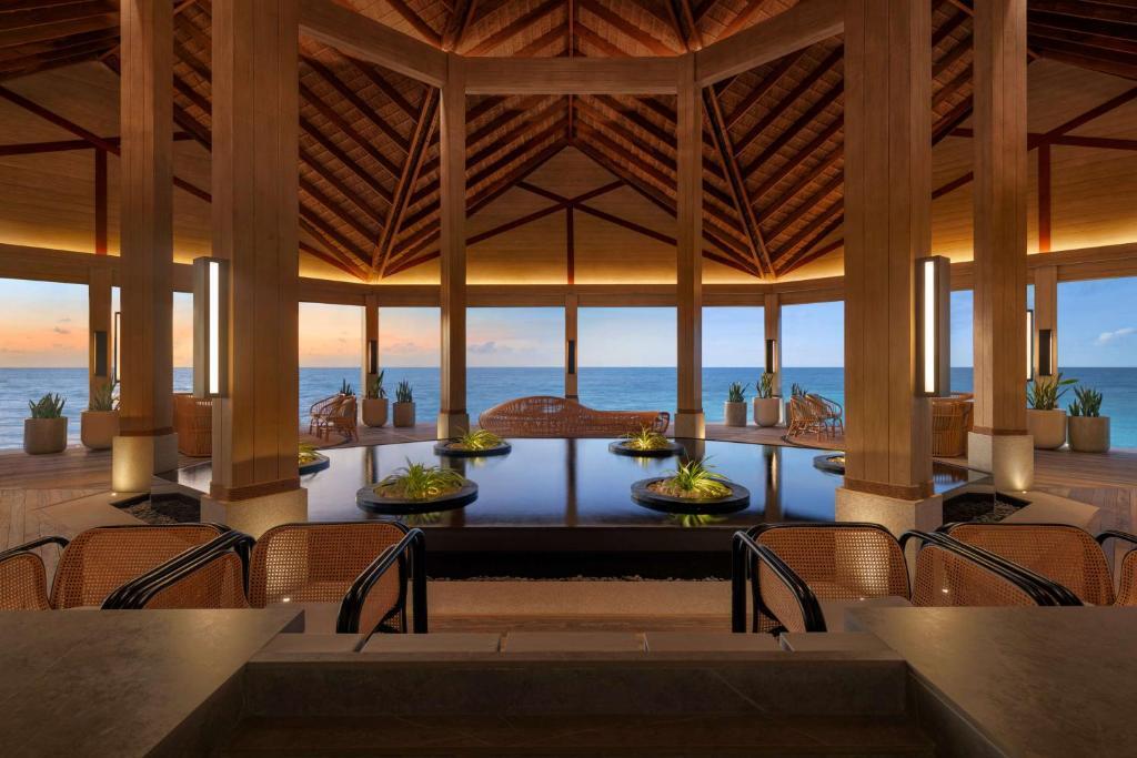 Курортный отель Hilton Maldives Amingiri Resort & Spa — фото 4