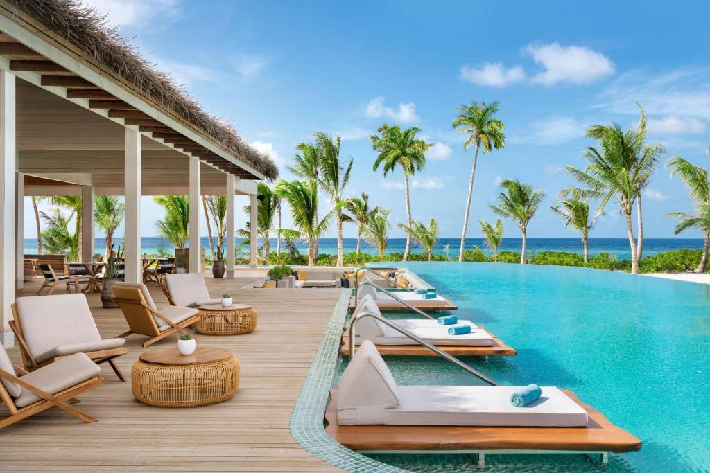 Курортный отель Hilton Maldives Amingiri Resort & Spa — фото 5