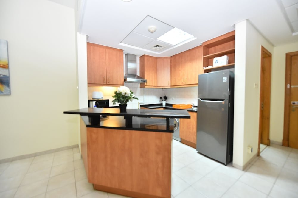 Дубай: BRID - Spacious 1 Bed with garden view