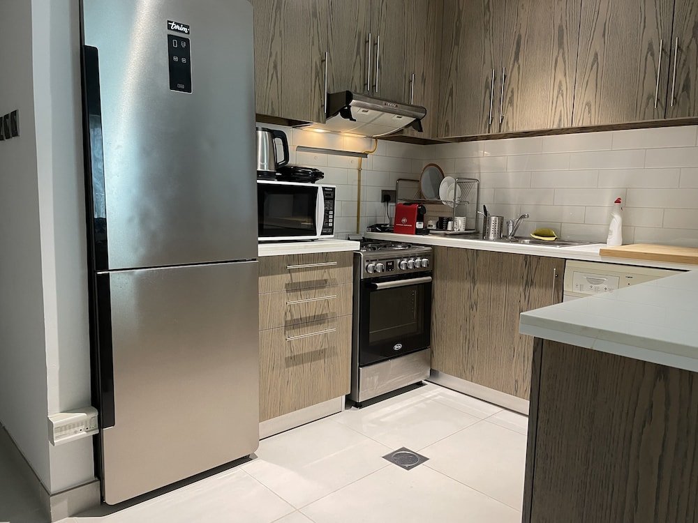 Дубай: Luxurious and Spacious One-bedroom Apartment in the Heart of Dubai