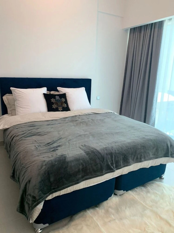 Дубай: Luxurious and Spacious One-bedroom Apartment in the Heart of Dubai