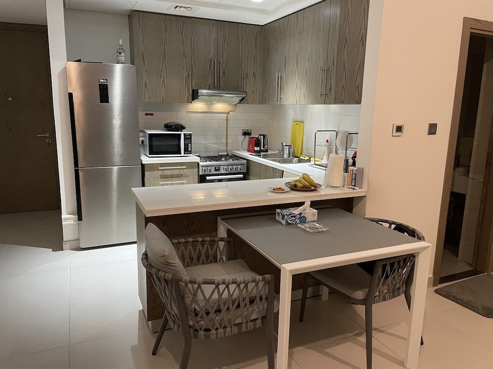 Дубай: Luxurious and Spacious One-bedroom Apartment in the Heart of Dubai