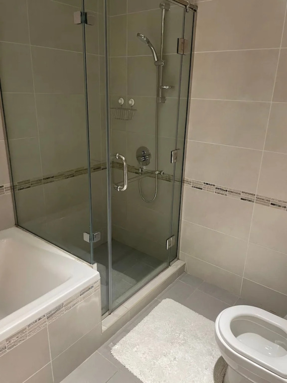 Дубай: Luxurious and Spacious One-bedroom Apartment in the Heart of Dubai
