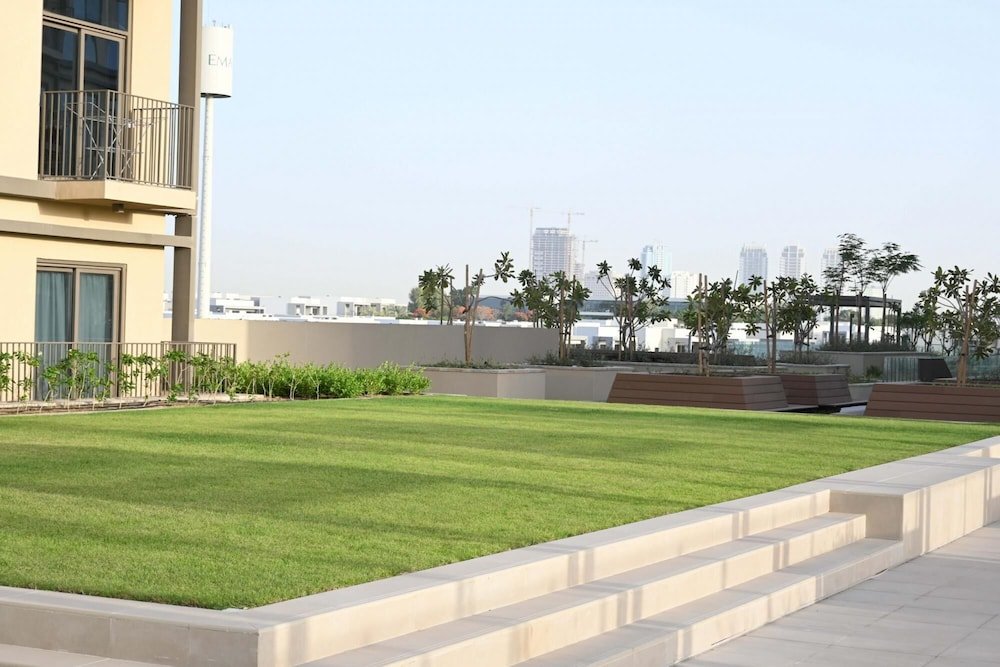 Дубай: Modern Boho 1BR Sleeps4 Balcony Pool Gym Dxbhills