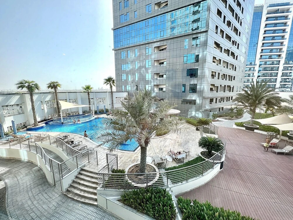 Дубай: SuperHost - Apartment With Stunning Pool View in Business Bay