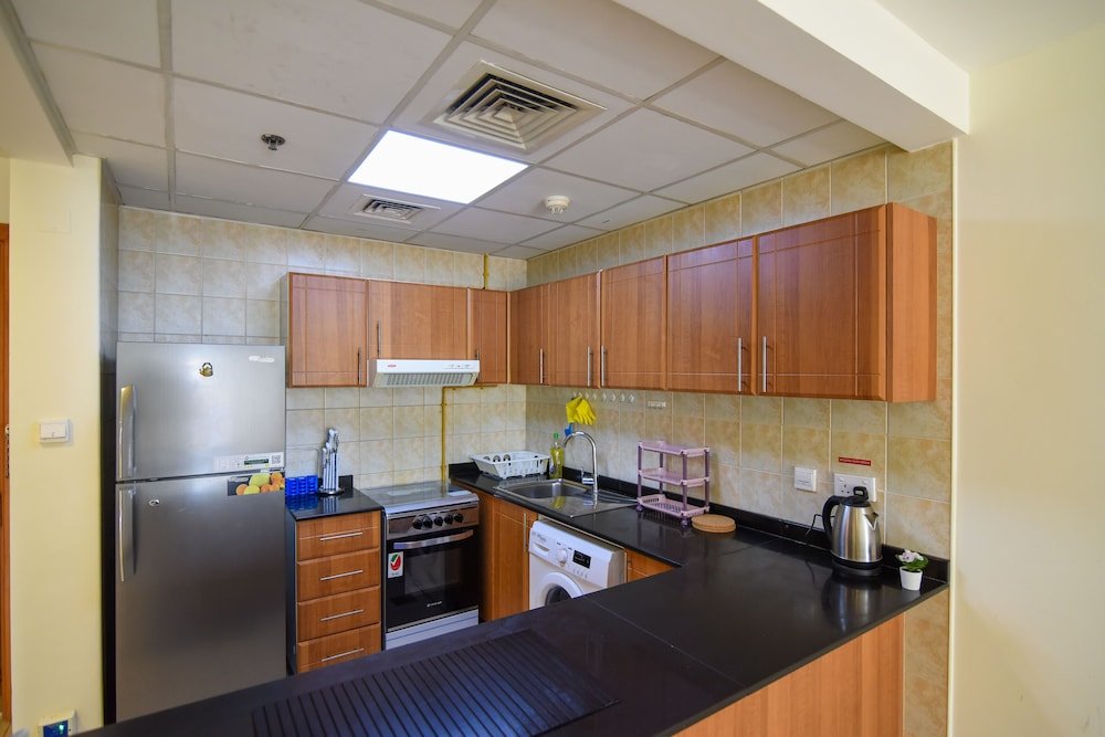 Дубай: GreenFuture - Spacious Apartment In Serene Area With Pool