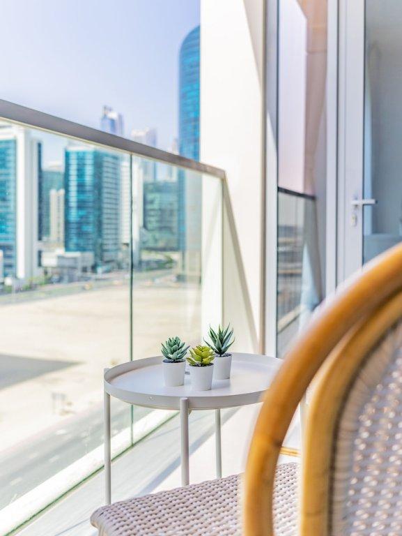 Дубай: Charming Tropical Apartment Minutes To Dubai Mall