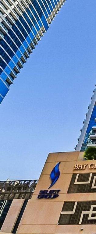 Дубай: KOHH – 1BR in Bay Central